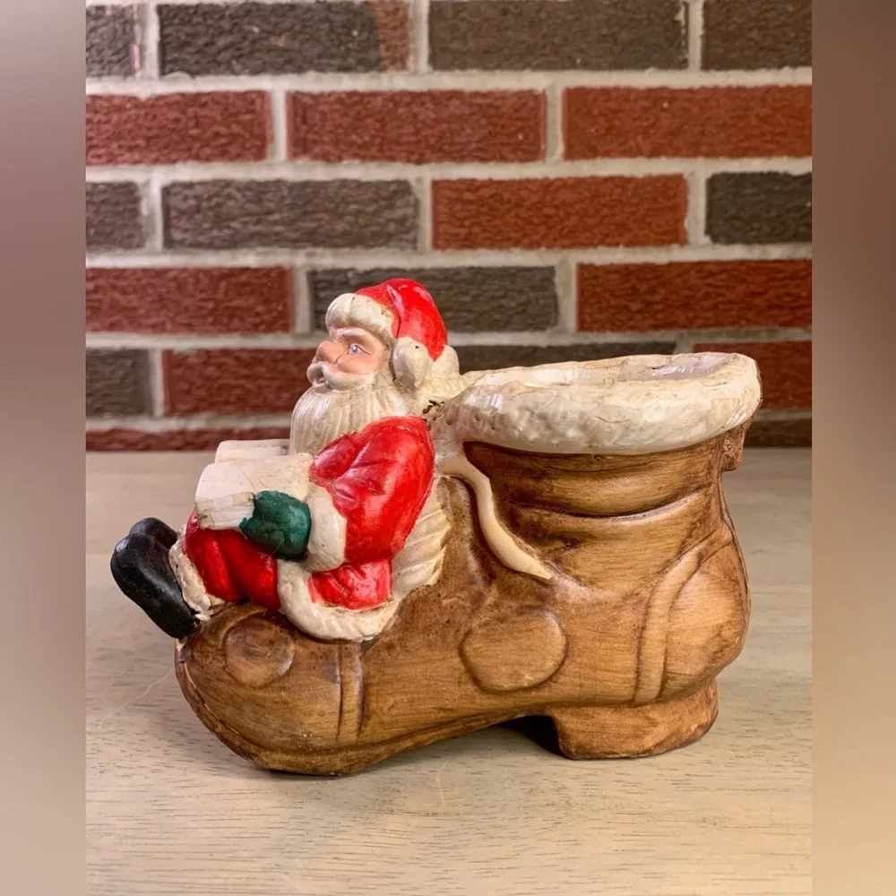 Vintage‎ Artmark’s Christmas Santa w/Book Sitting on Ceramic Boot Shoe Planter